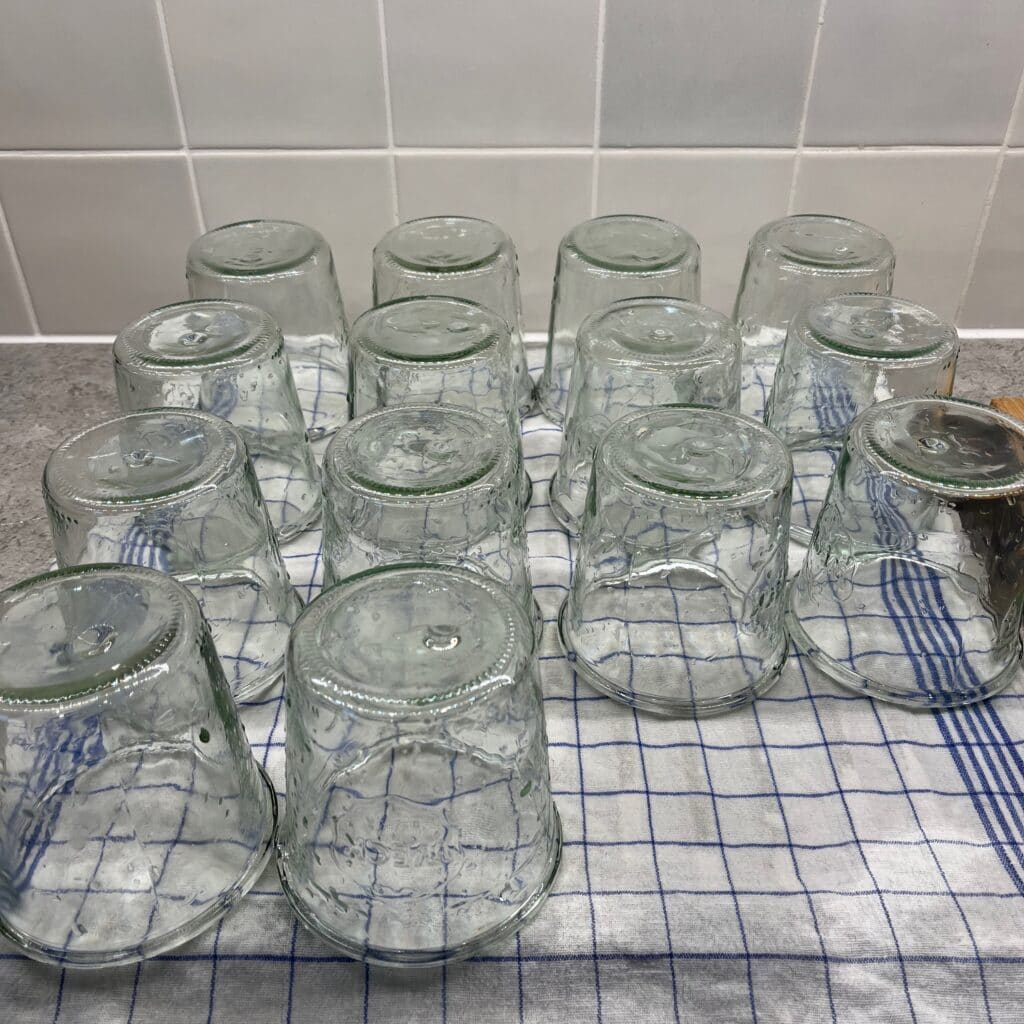 Canning-with-Weck-jars - 1 Clean canning jars dripping off on the drying rack before use