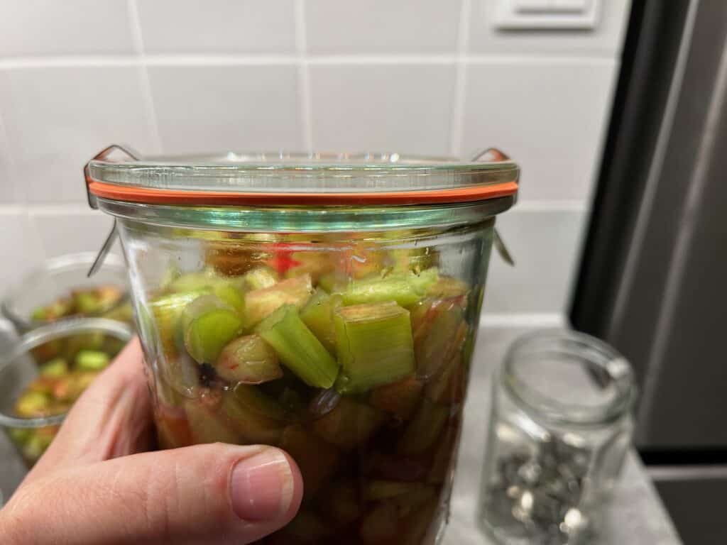 Canning-with-Weck-jars - 10 side view of jar of rhubarb showing correct placement of the rubber seal and lid clamps